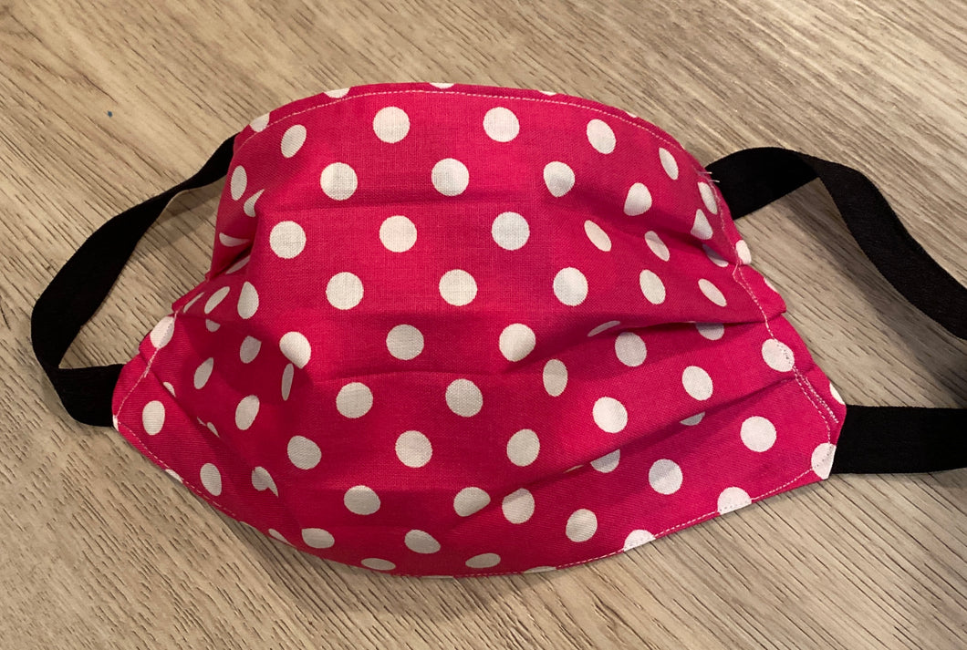 Face Mask is cotton,washable, reversible , handmade,  great for protection in  raspberry polka dot reverses  to black and white polka dot 